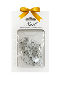 Elegant white nail bows add a delicate, feminine touch to your manicure.
