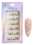 Silver And Copper Stone Embellishments. These premium decorative stones add instant glamour and dimension to any manicure design.