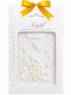 Elegant white bows designed to elevate your nail art. Perfect for adding a delicate, feminine touch to any manicure.