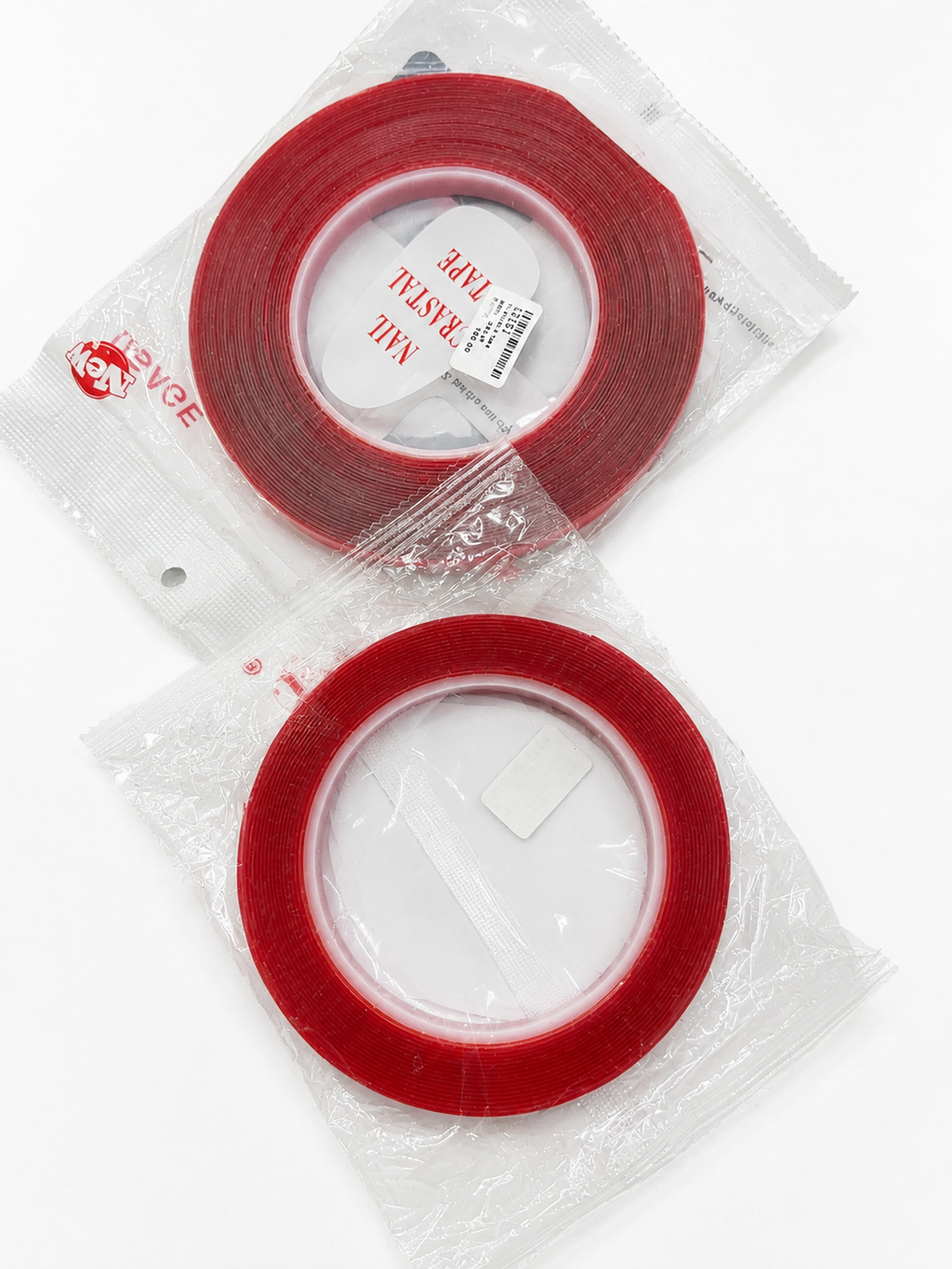 Double-sided adhesive tape designed specifically for securing nails and nail art applications.