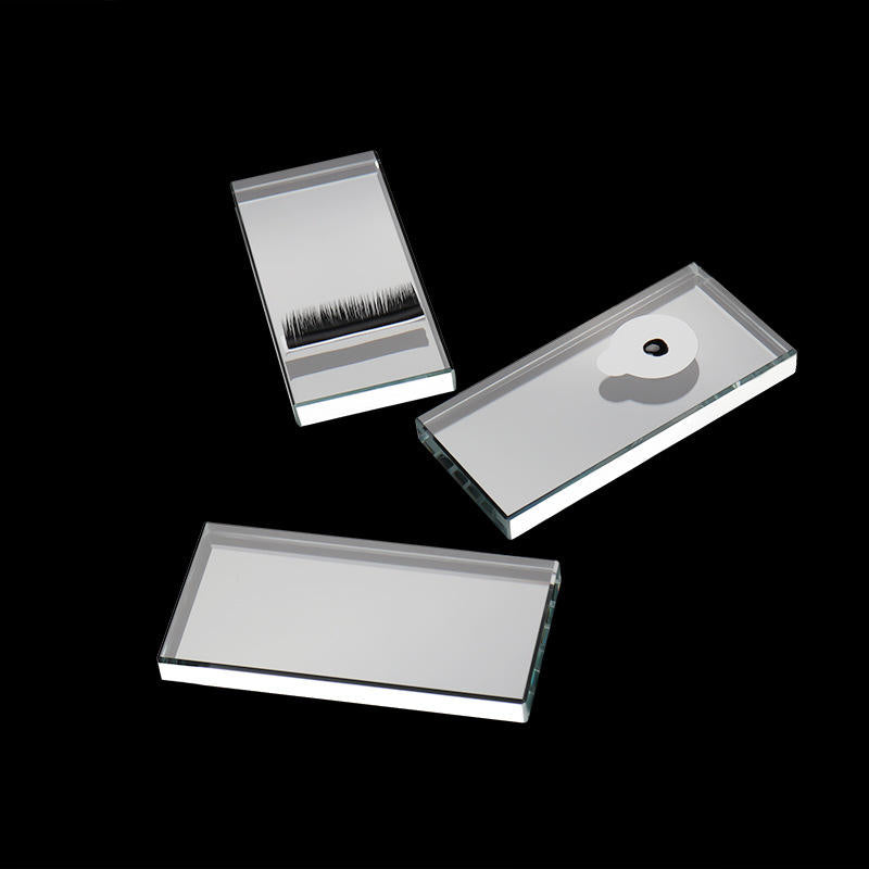 Achieve flawless lash application with this precision eyelash mirror.