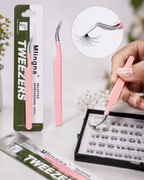 Pink Milinaga Tweezers professional false eyelash tweezers shown in their packaging, with a hand holding one tweezier over a tray of false eyelashes, and an inset showing the tweezier lifting a lash cluster.