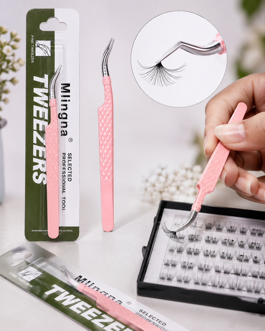 Pink Milinaga Tweezers professional false eyelash tweezers shown in their packaging, with a hand holding one tweezier over a tray of false eyelashes, and an inset showing the tweezier lifting a lash cluster.