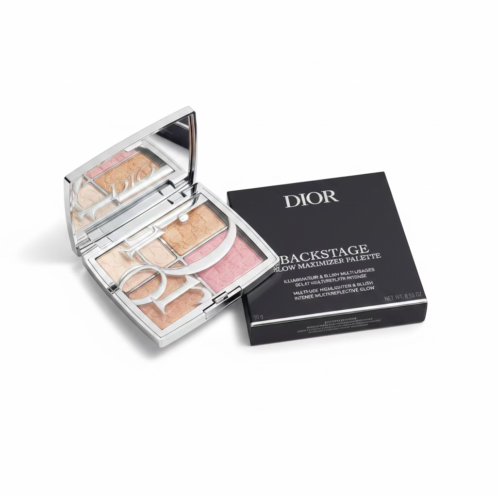 Dior Backstage Glow Master Palette and its black packaging box, displayed on a reflective glass surface with other makeup items in the background.