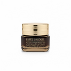 Estée Lauder Advanced Night Repair Eye Supercharged Creme in a dark brown jar with a shiny gold lid, displayed on a glass shelf in a retail store.
