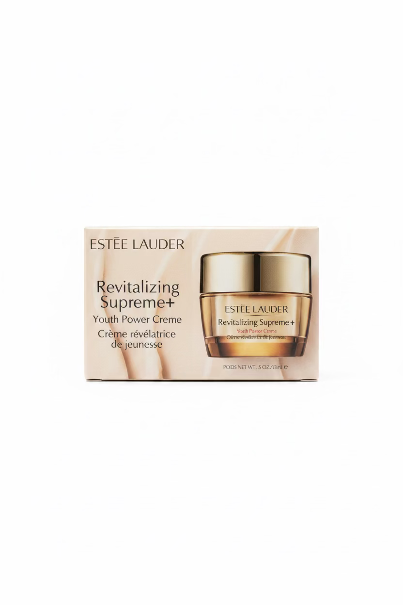 Estee Lauder Revitalizing Supreme+ Youth Power Creme in its original white and gold packaging, displayed on a glass counter with a laptop and a person in the background.