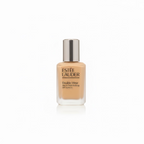 Estée Lauder Double Wear Stay-in-Place Makeup SPF 30 foundation bottle in the shade 2350 on a glass counter, with its blue box next to it and a laptop in the background.
