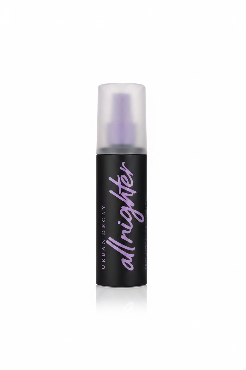 Urban Decay All Nighter foundation bottle with a black body and frosted cap, displayed on a glass counter in a retail store.