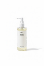 Anua Heartleaf Pore Control Cleansing Oil in a 250 mL pump bottle, displayed on a glass shelf in front of Medicut+ skincare boxes.