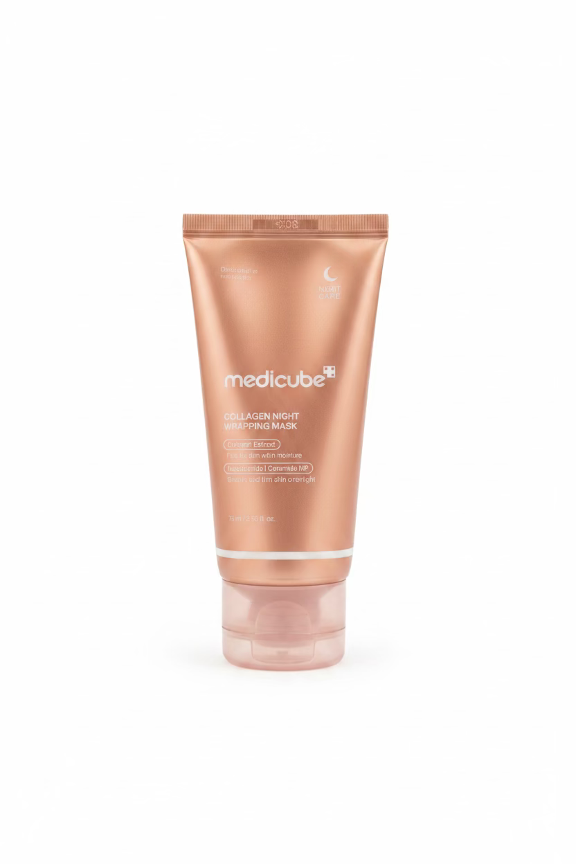 A tube of Medicube Collagen Night Wrapping Mask in a metallic bronze color, displayed on a glass counter in a retail store setting.