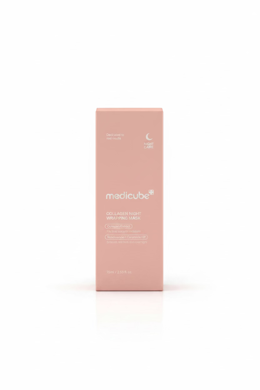 A pink rectangular box of medicube Collagen Night Wrapping Mask standing on a glass display counter in a retail store. The background shows shelves with other products and a person standing behind.