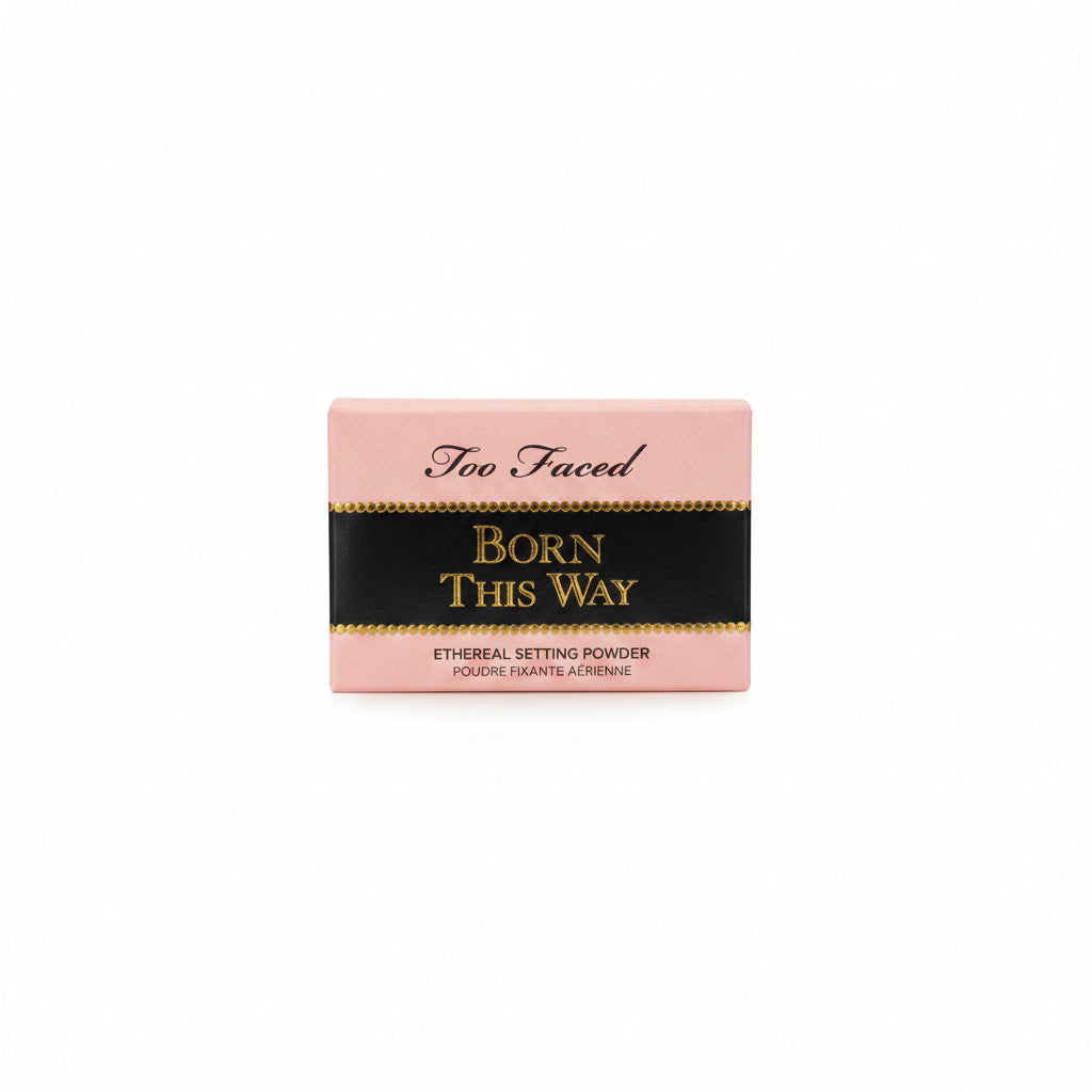 Too Faced Born This Way Effortless Makeup Primer box in pink and black packaging, shown on a glass display counter in a store.