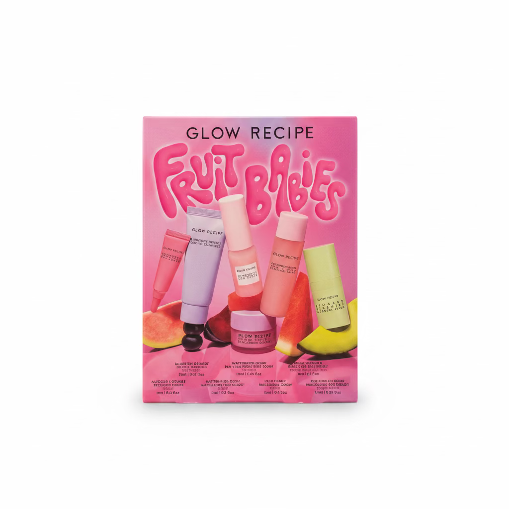 A Glow Recipe Fruit Babies makeup set box displayed on a glass counter inside a retail store. The pink box features the brand name 'GLOW RECIPE' and the product line 'Fruit Babies' in large pink lettering, with illustrations of fruit and makeup tubes.