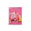 A Glow Recipe Fruit Babies makeup set box displayed on a glass counter inside a retail store. The pink box features the brand name 'GLOW RECIPE' and the product line 'Fruit Babies' in large pink lettering, with illustrations of fruit and makeup tubes.