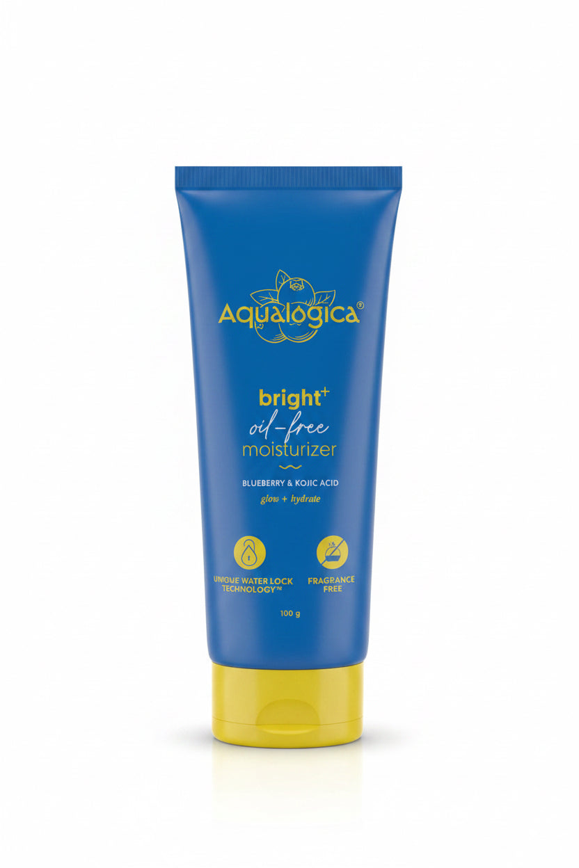 A tube of Aqualógica bright oil-free moisturizer, blue with a yellow cap, displayed on a glass counter inside a retail store.