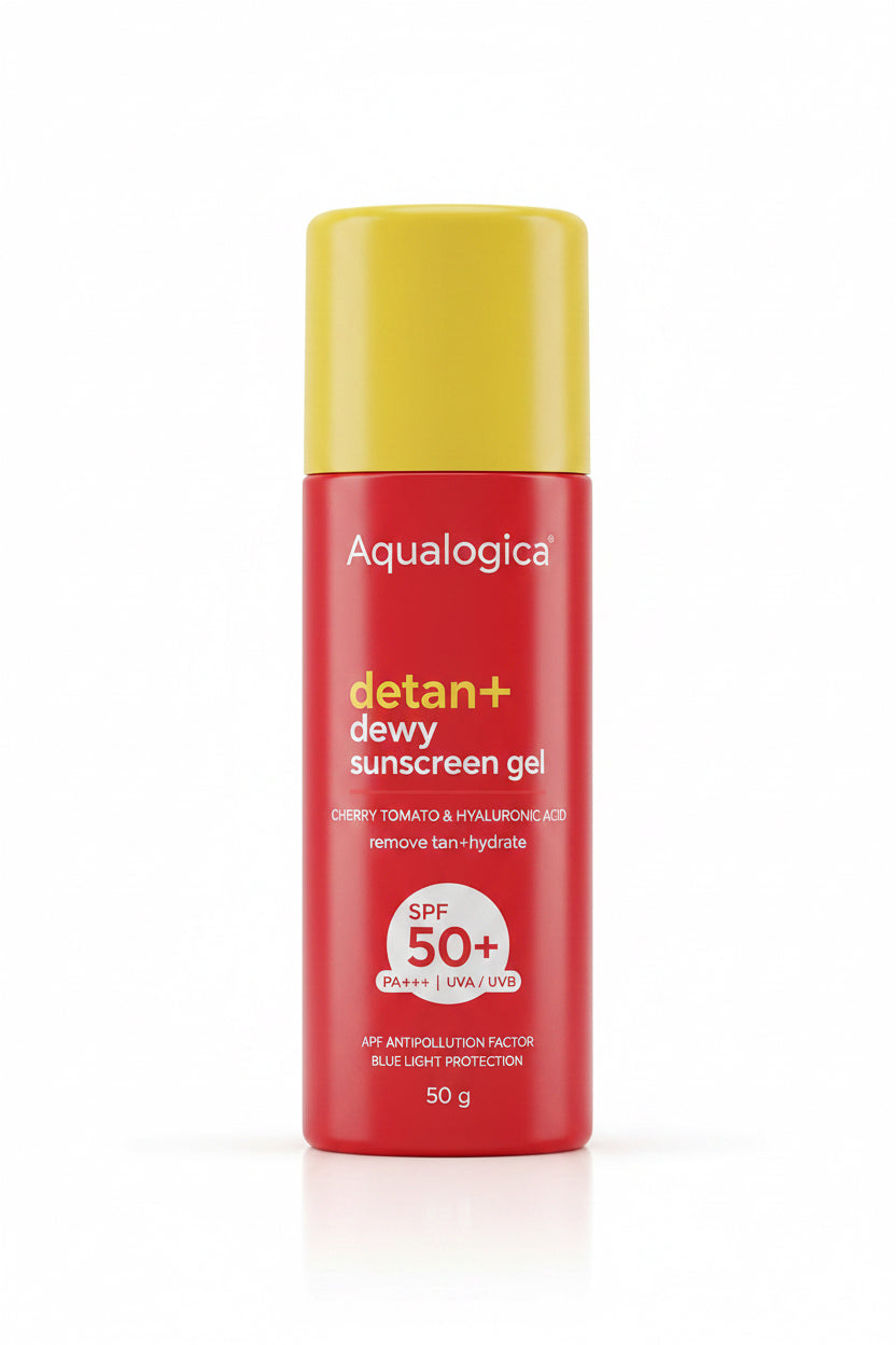 A red aerosol can of Aqualogica Detan Daily Sunscreen Gel SPF 50+ with a yellow cap, standing on a white surface in front of an open laptop in a retail or office setting.