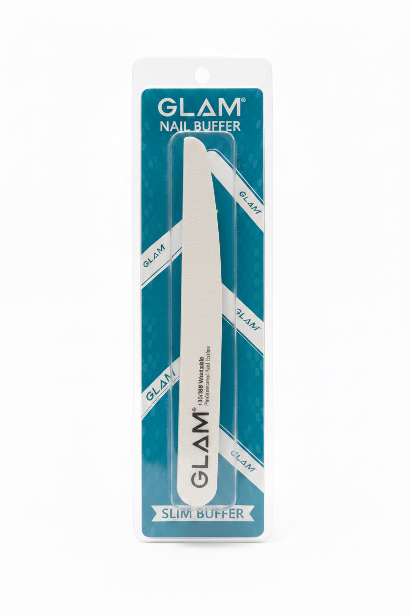 A packaged Glam Nail Buffer Slim Sutter in its original blue and white blister packaging, standing in front of an open laptop computer.