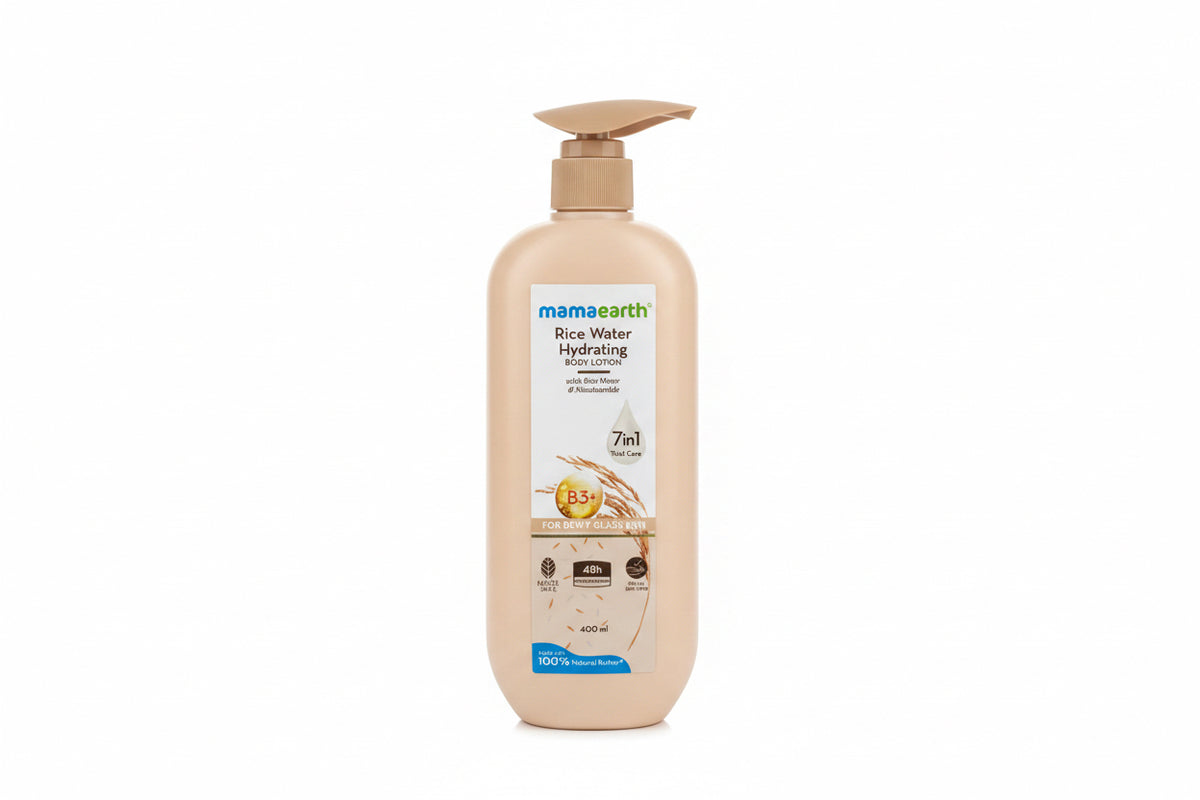 A bottle of Mama Earth Rice Water Hydrating Face Lotion standing on a wooden surface in an indoor setting with textured wall panels and dark furniture in the background.