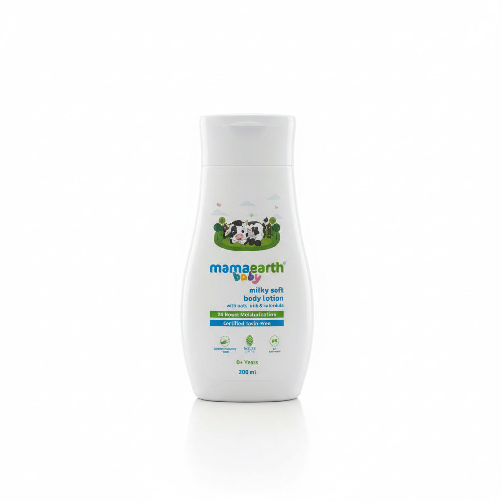 A bottle of Mamaearth Baby Milky Soft Body Lotion is shown on a desk in front of a laptop, with Mamaearth product boxes in the background.