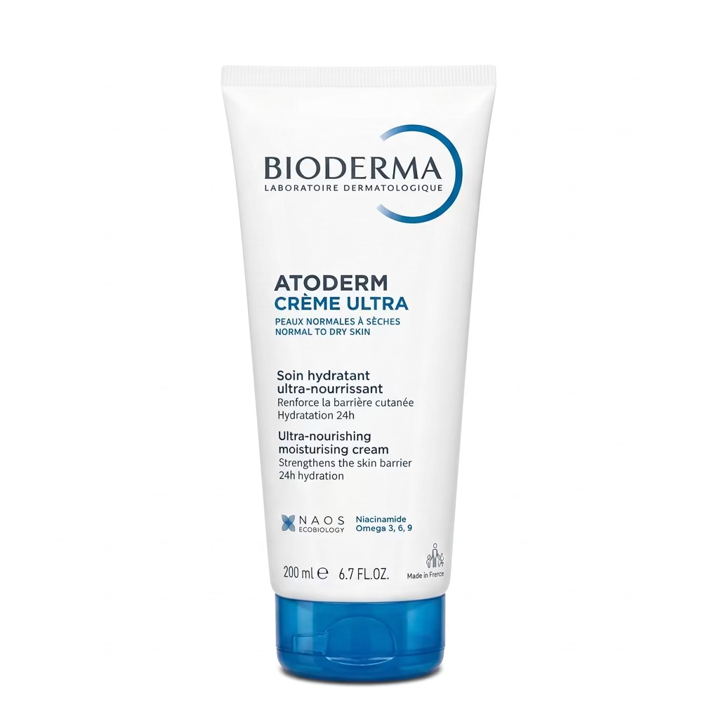 A tube of BIODERMA ATODERM CRÈME ULTRA moisturizing cream, placed on top of a receipt sheet on a counter.