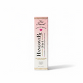 Too Faced Hangover Rx 3-in-1 Replenishing Primer & Setting Spray in a tall pink box, displayed on a glass counter with a blurred cosmetics store background.