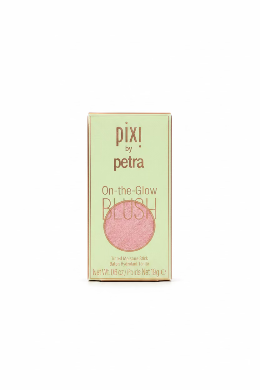 Pixi by Petra On-the-Glow Blush foundation box displayed on a glass shelf in a store setting.
