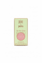 Pixi by Petra On-the-Glow Blush foundation box displayed on a glass shelf in a store setting.