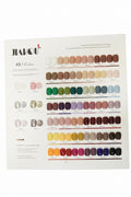 A JIAKOU nail polish color chart sheet displaying 481 colors in organized rows, featuring various shades from nude and beige tones to bright pinks, greens, purples, and yellows, photographed against a plain white background.